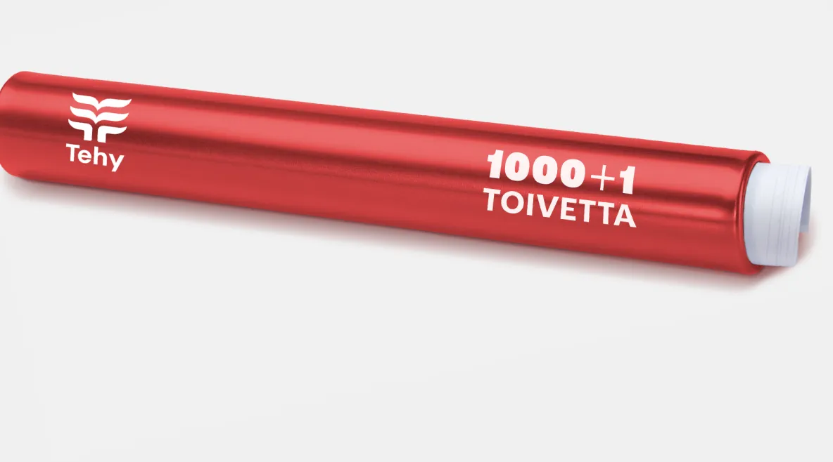 Punainen viestikapula, jonka päällä lukee Tehy tuhat ja yksi toivetta ja sisällä on paperikäärö.. 