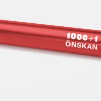 Punainen viestikapula, jonka päällä lukee Tehy tuhat ja yksi toivetta ja sisällä on paperikäärö.. 