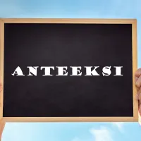 Taulu, johon on kirjoitettu sana &quot;anteeksi&quot;. 